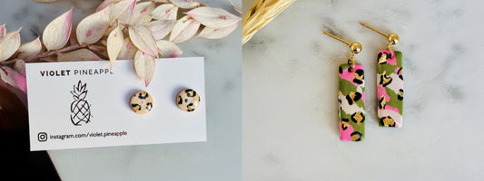 A vibrant collection of Violet Pineapple’s best-selling leopard print earrings, featuring cream, black, and gold studs alongside drop earrings in green, black, pink, and gold.