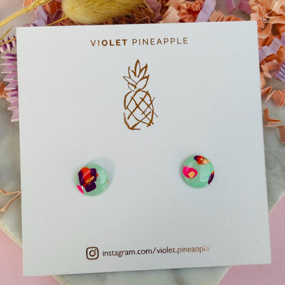 Cool retro-inspired stud earrings, handmade with polymer clay.