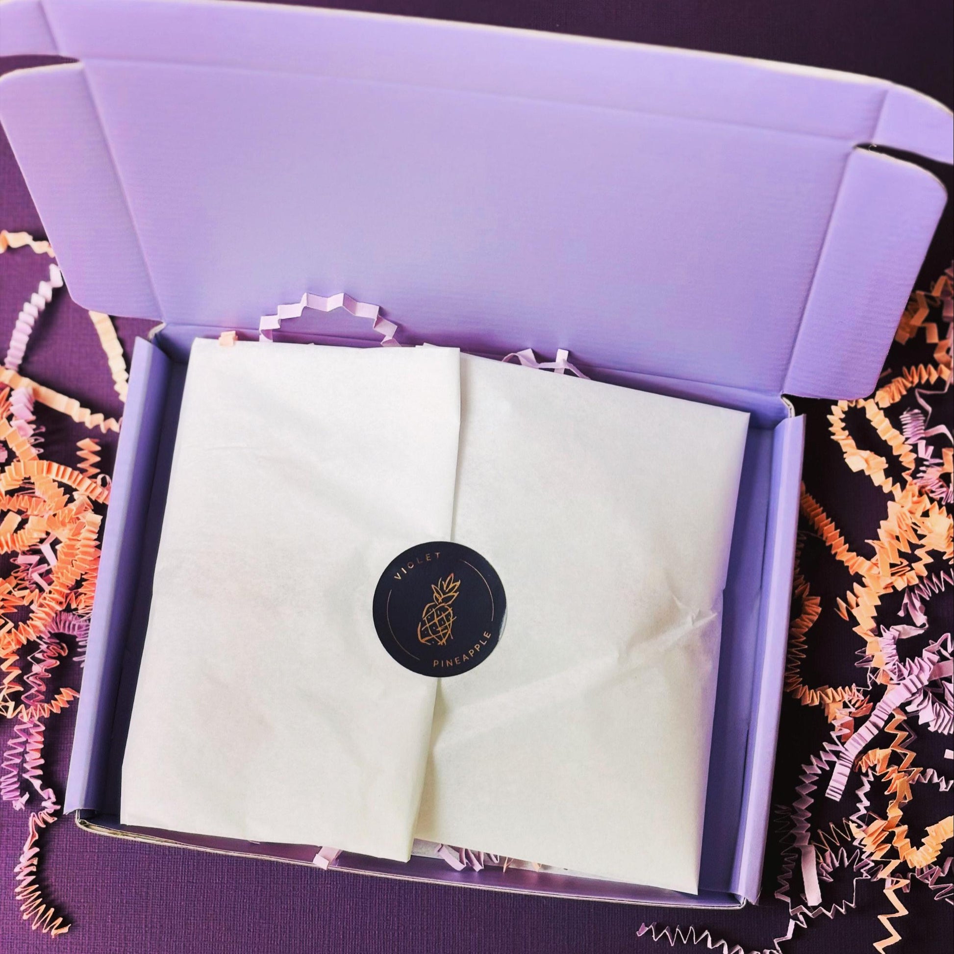 Your order arrives beautifully presented in a 'Violet Pineapple' gift box.