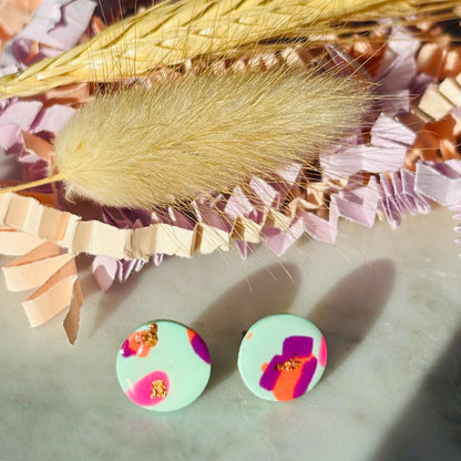 Cool retro-inspired stud earrings, handmade with polymer clay.
