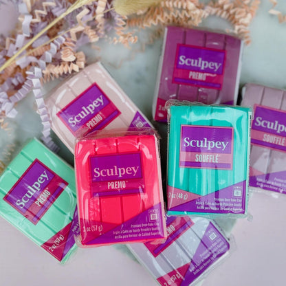 Lovingly handcrafted from premium Sculpey Premo polymer clay for exceptional quality and vibrant colours.