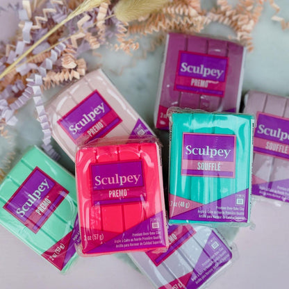 Lovingly handcrafted from premium Sculpey Premo polymer clay for exceptional quality and vibrant colours.